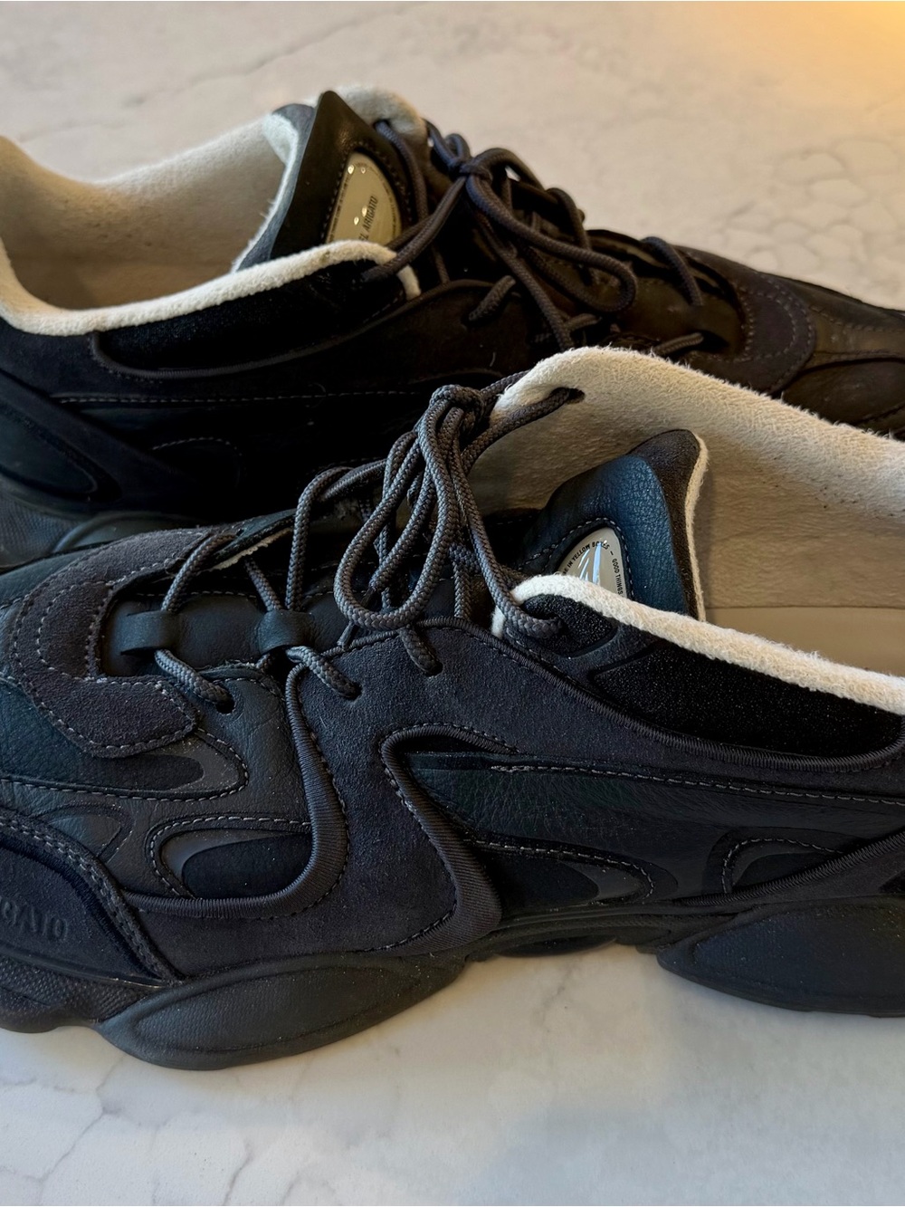 Axel Arigato Black Sneakers with Off-White Lining